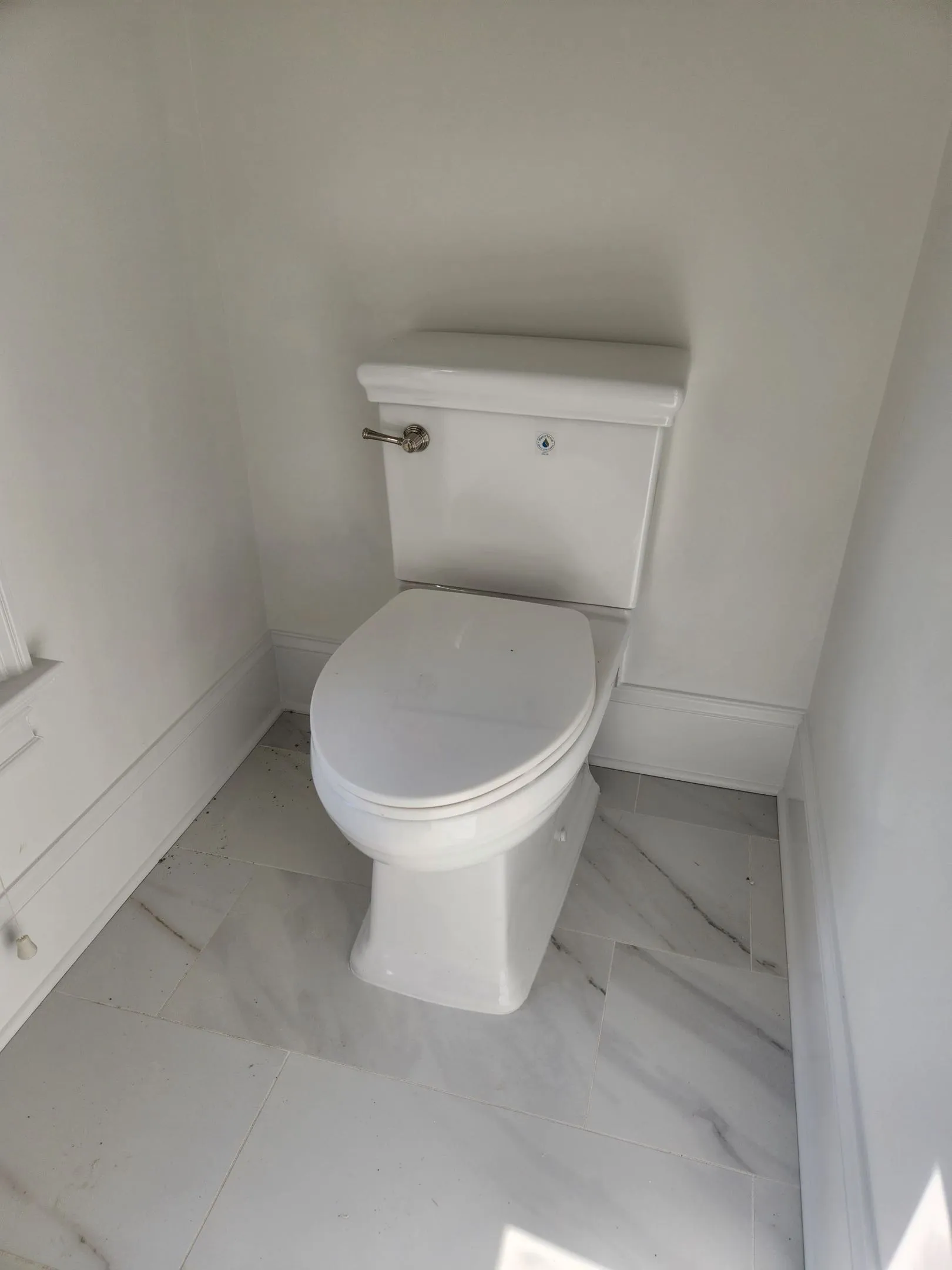 Modern toilet installation in Charlotte home — Direct Service Plumbing