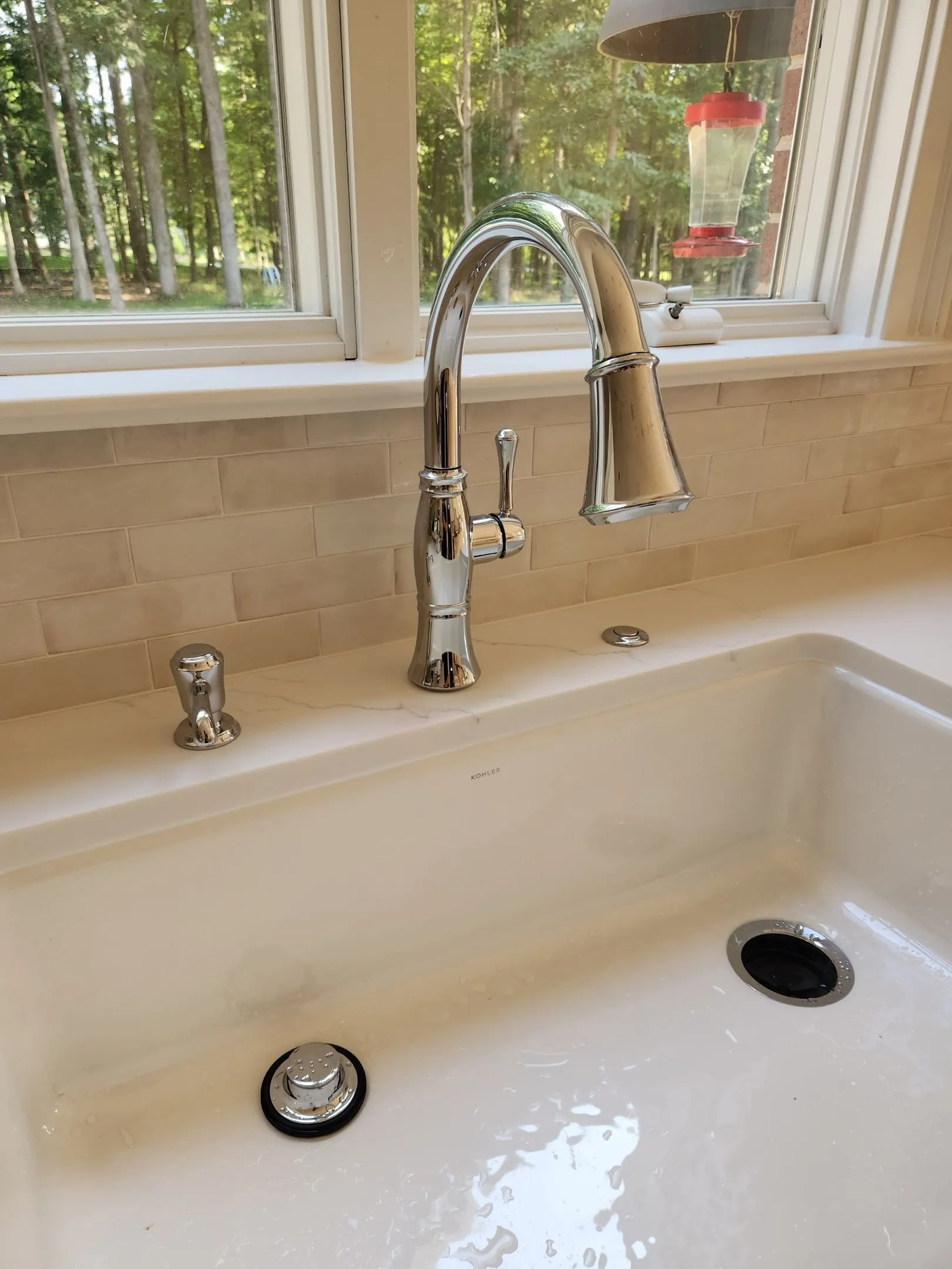 Farmhouse kitchen sink installation by Direct Service Plumbing Charlotte