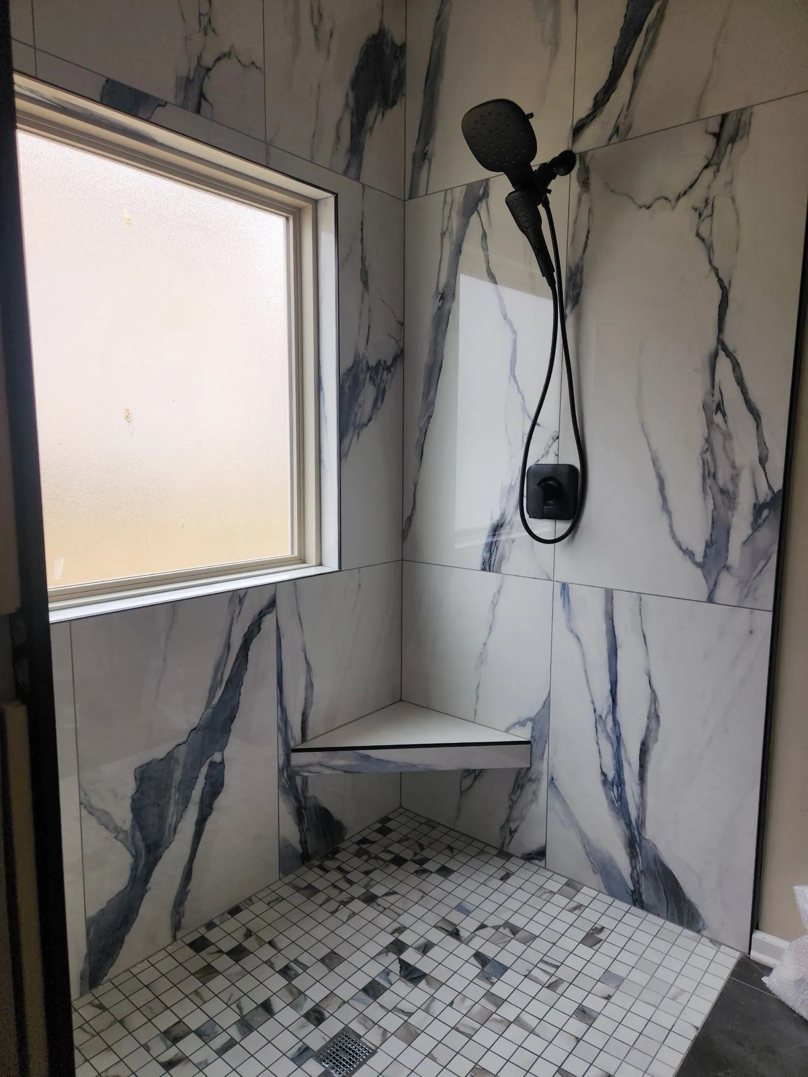 Dramatic marble shower with bench seat — Direct Service Plumbing Charlotte NC
