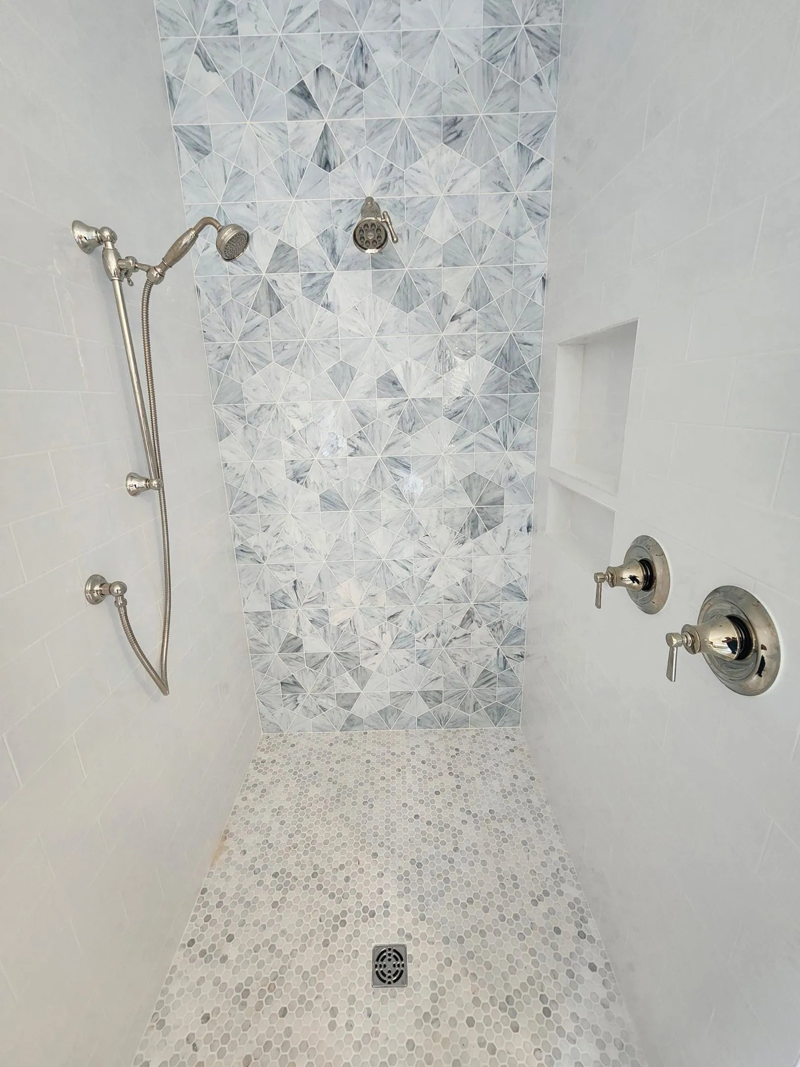 Luxury marble mosaic shower installation by Direct Service Plumbing